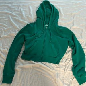 green hollister cropped zip up hoodie women’s M